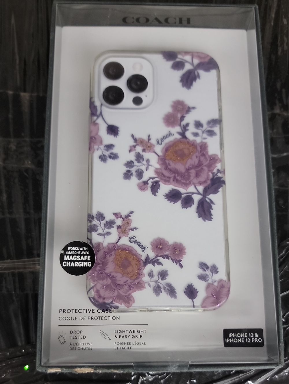 COACH White Phone 12/12 Pro Case with Purple Floral Design